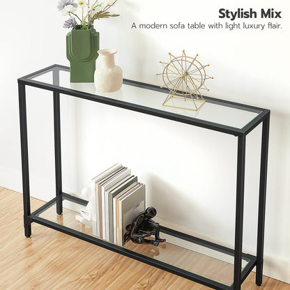 Modern sofa table with decorative items on a wooden floor