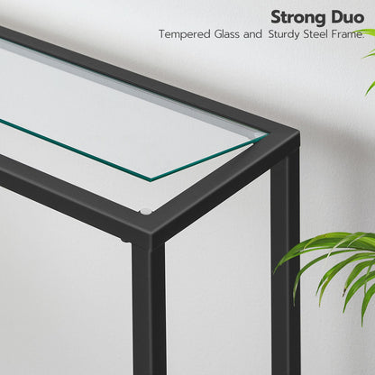 Glass table with black frame on a white background, featuring text about material composition.