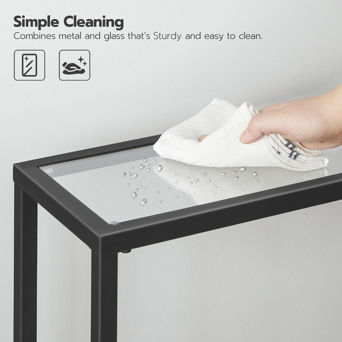 Person cleaning a glass table with a cloth, with text about combining metal and glass.